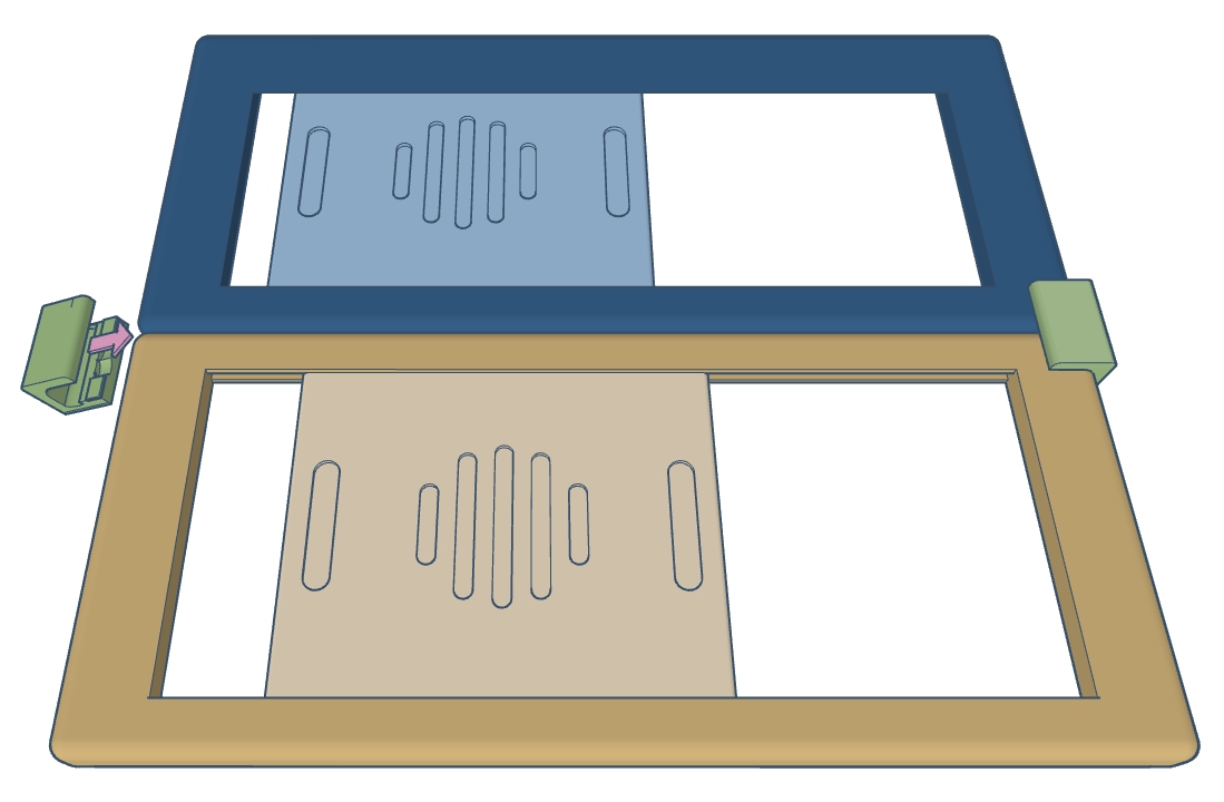 Two DoDone frames held edge to edge with a clip about to go on the join