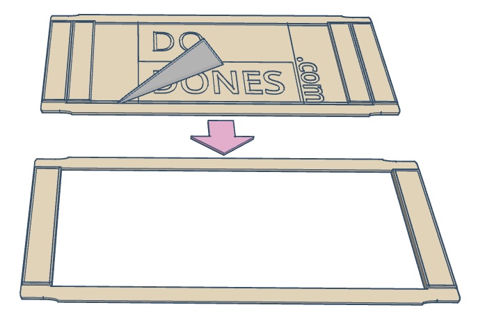 A pointed tool cutting the perforated back panel out of a DoDone, leaving an open frame