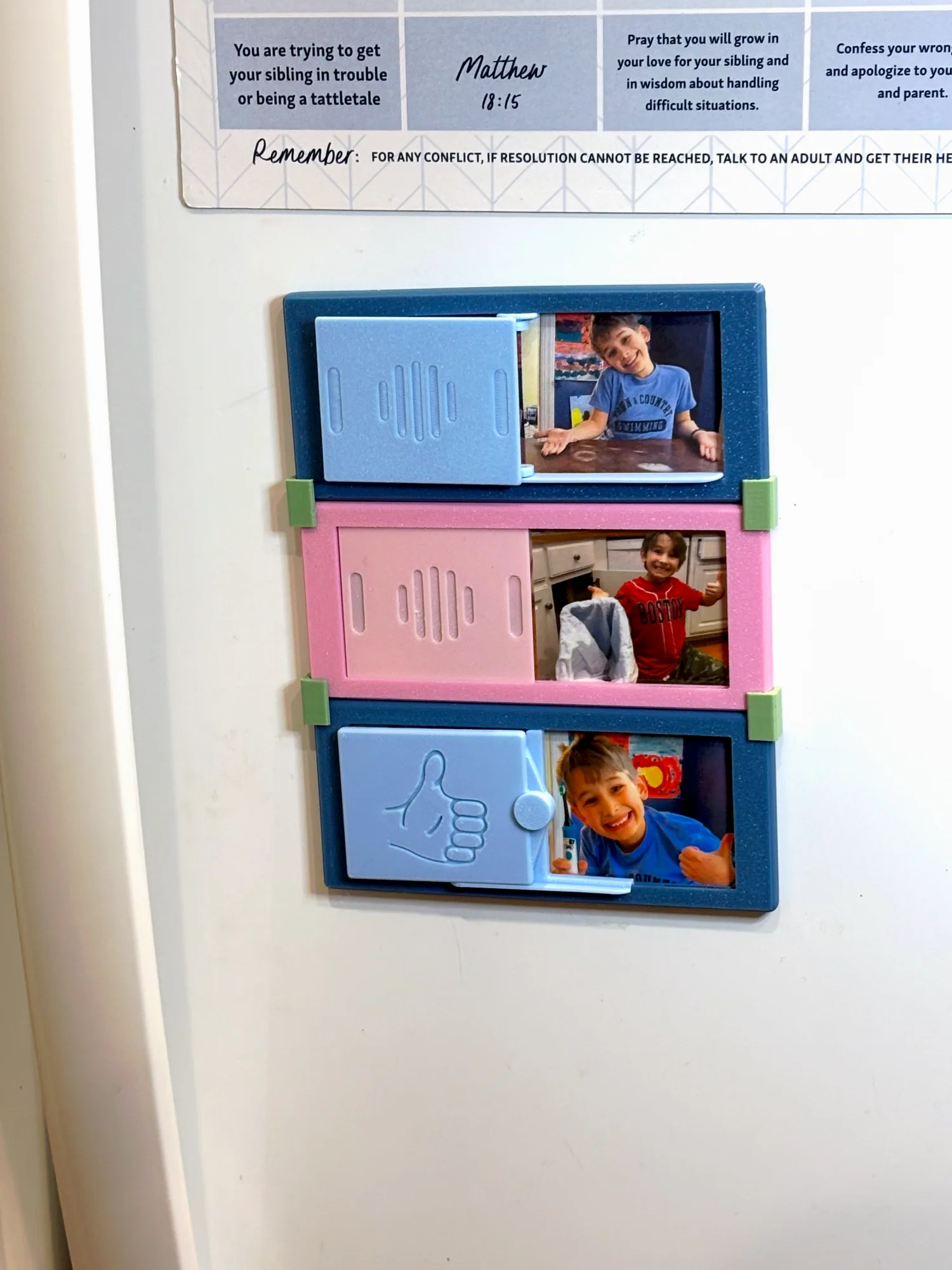 Three DoDones clipped together on a fridge door